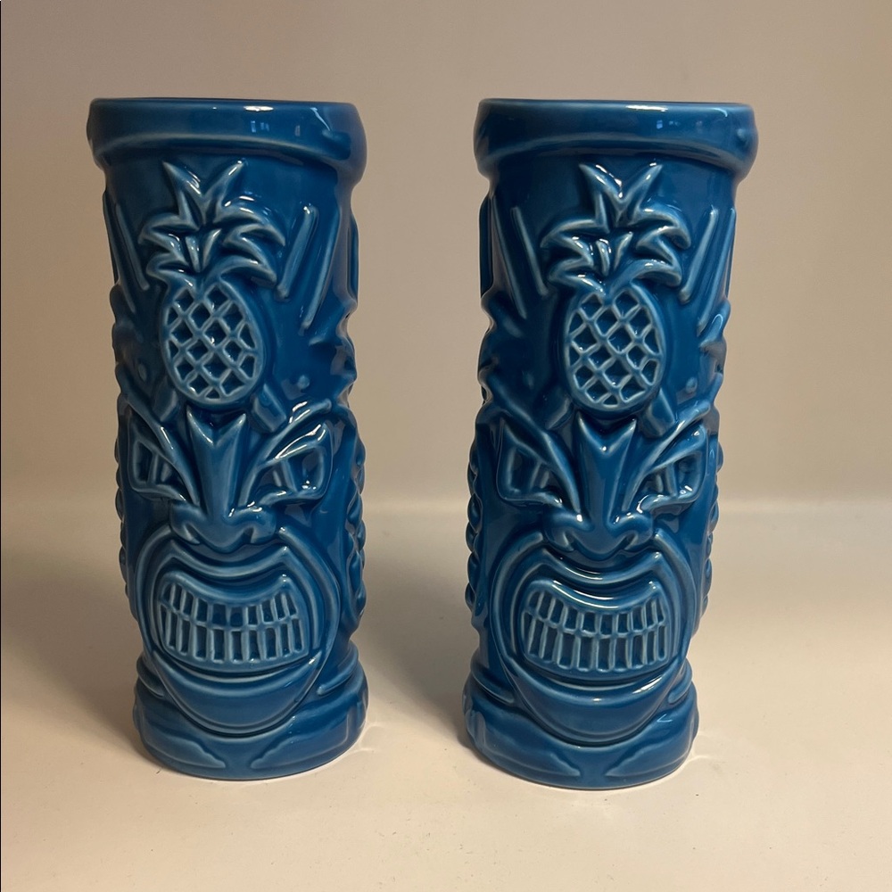 Pair (two) Tommy Bahama Rum ceramic tiki glasses in a beautiful blue color!